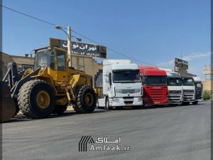 فروش۱۳۰۰۰مترصنعتی تجاری با۳۰باب مغازه همدان صالح اباد